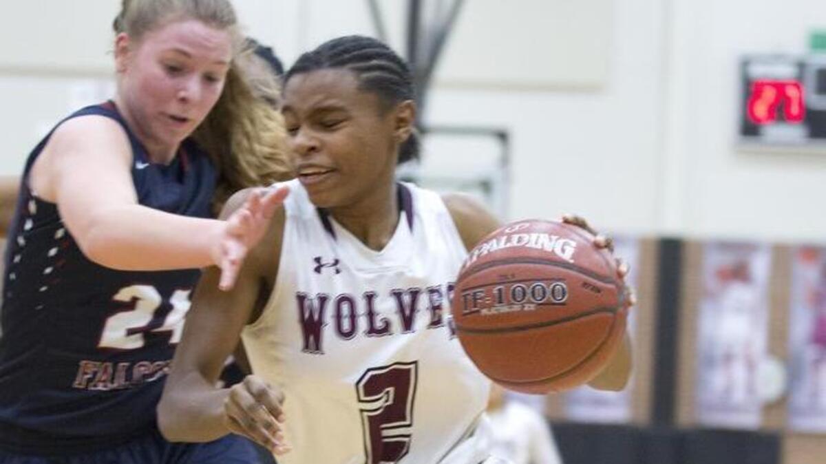 Timberview No. 2 Destiny Jackson drives for the hoop against Tompkins’ No. 24 Kim Lauritano