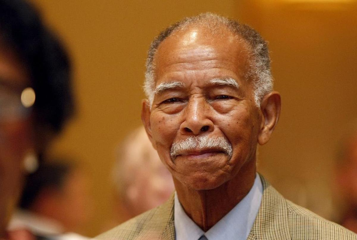 Former Dunbar basketball coach Robert Hughes at a luncheon in his honor July 31, 2013.