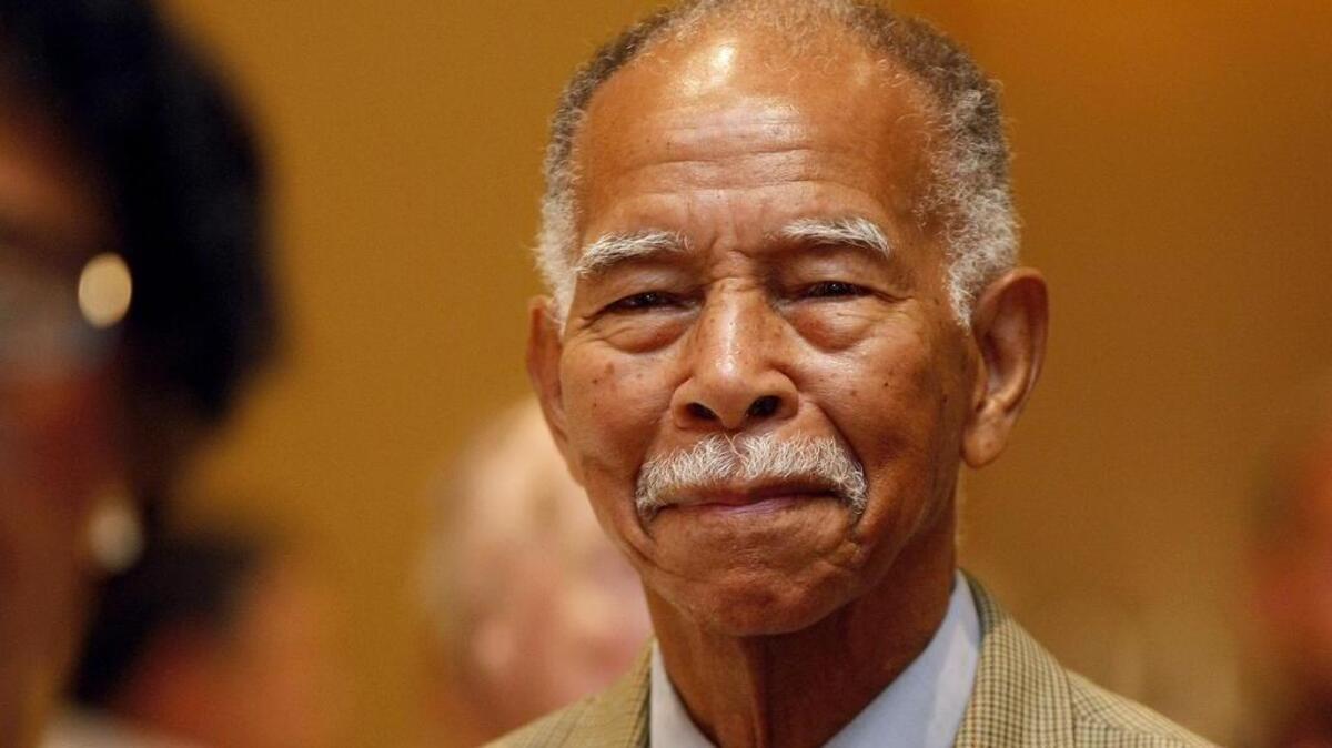 
Former Dunbar basketball coach Robert Hughes at a luncheon in his honor July 31, 2013.