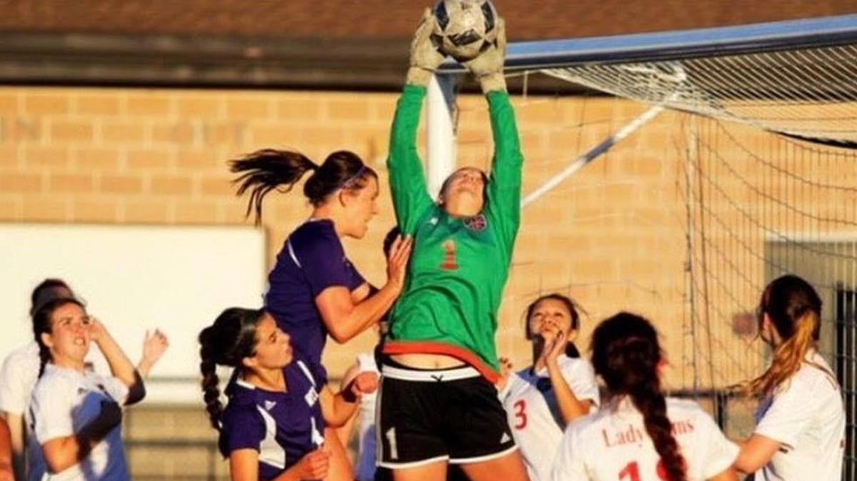 Mineral Wells goalie Reagan Carter (green) made 11 saves in two games.