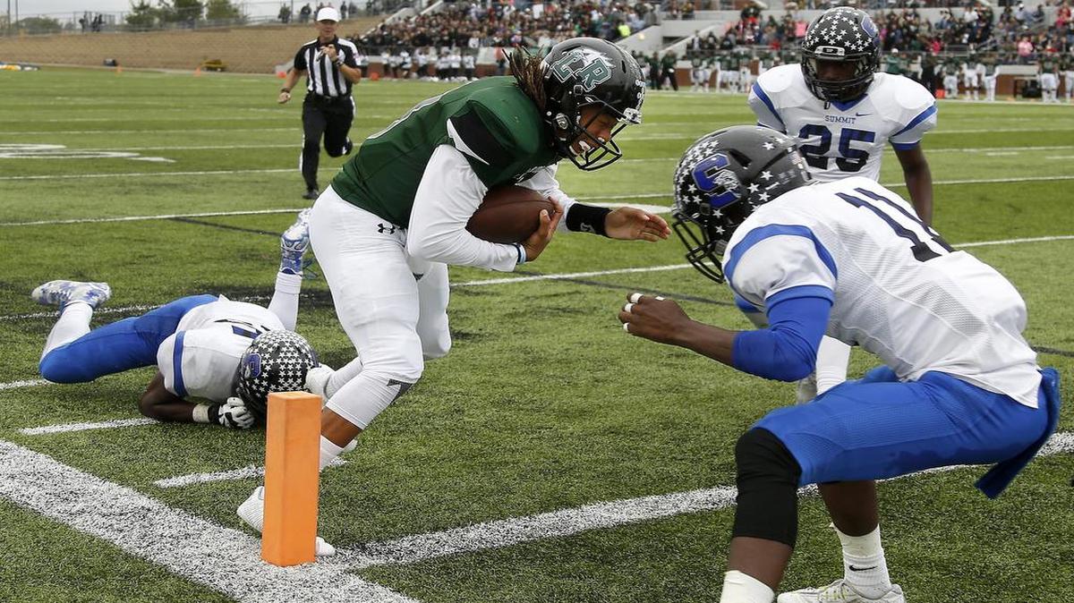 Mansfield Lake Ridge quarterback Jeff Duffey, scoring against Mansfield Summit this season, has accounted for 4,095 yards and 47 touchdowns (27 pass, 20 rush) in 2015.