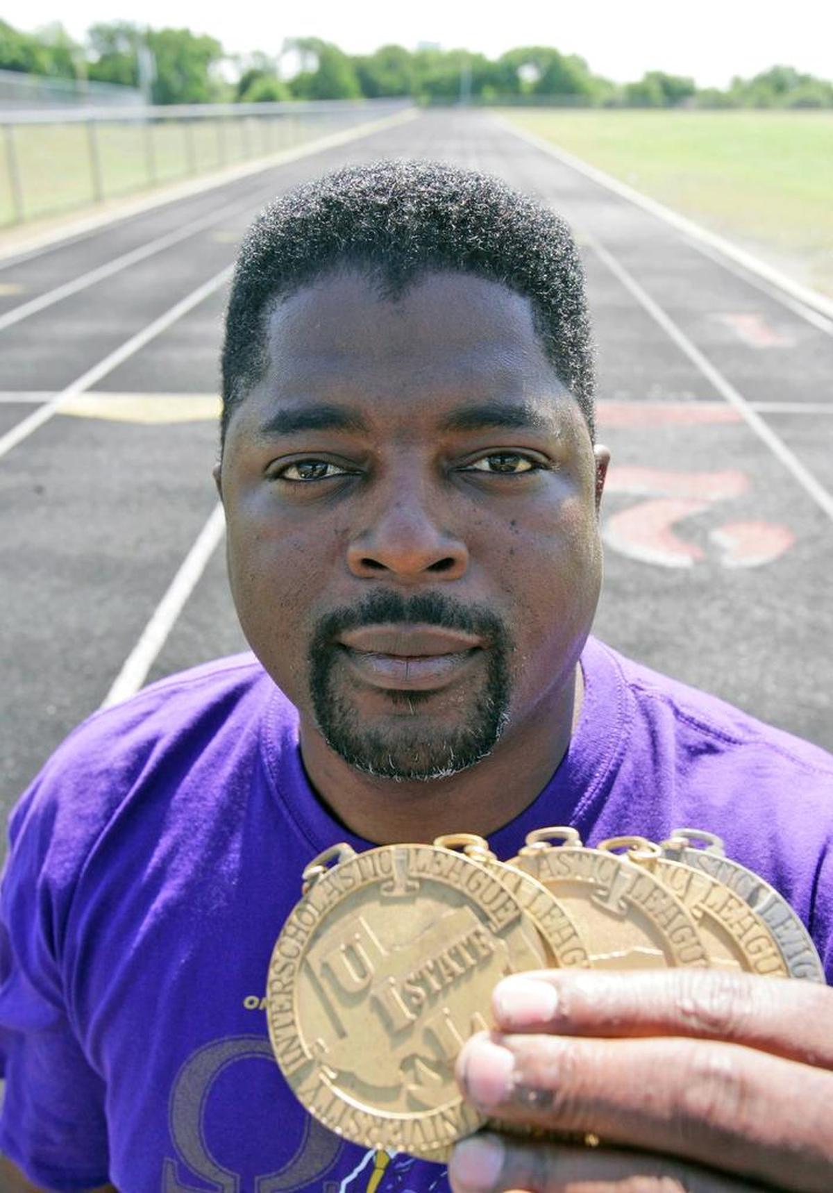 Roy Martin poses with his UIL State Track medals in 2008 in Cedar Hill. Martin’s 1985 record setting finish in the 200 meter race remains a state record from a meet that ranks among the best for Texas sprinters.