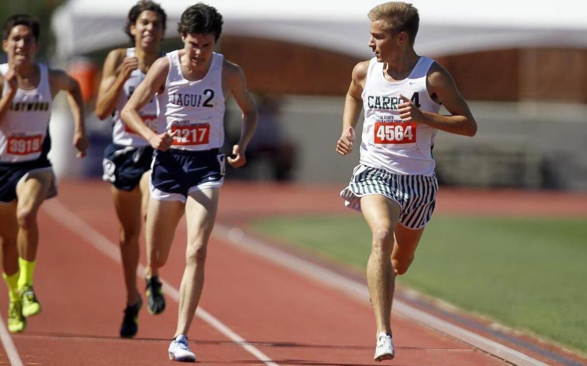 Southlake Carroll senior Reed Brown, right, wins the Class 6A 3,200-meter run at the UIL state track meet in Austin, May 12, 2017.