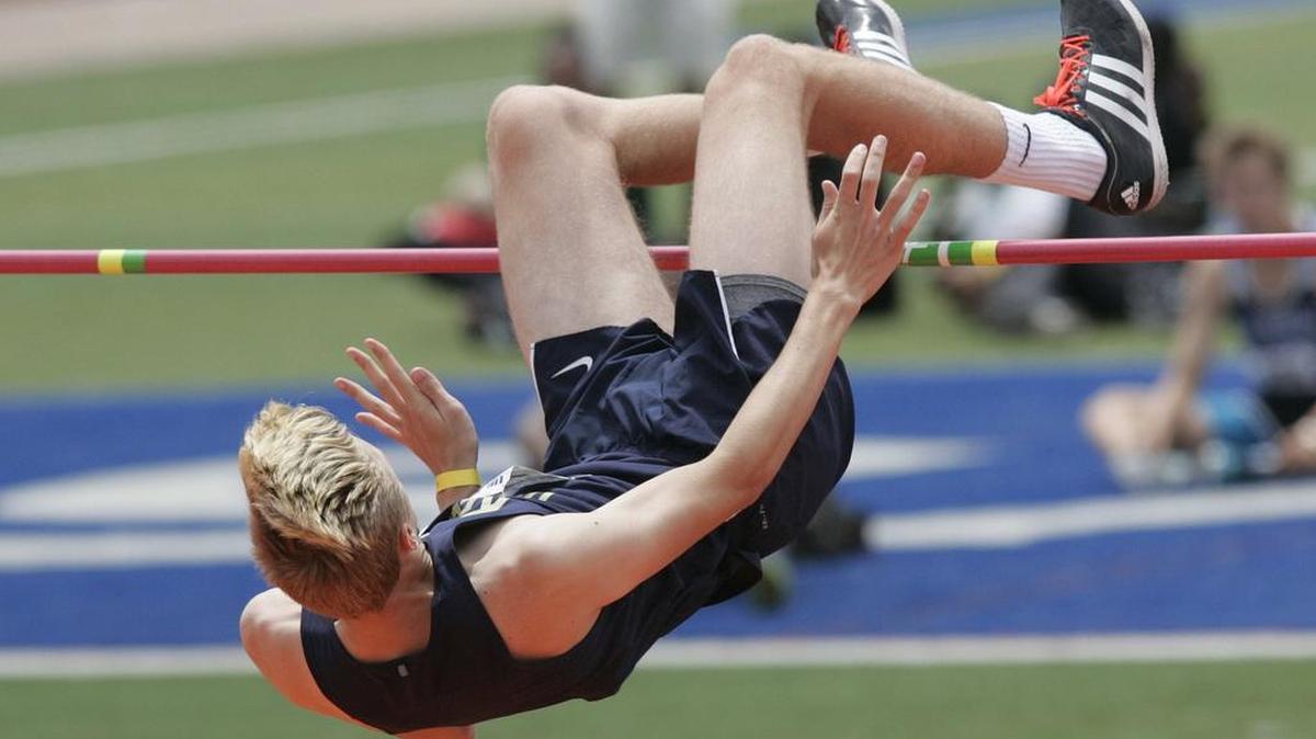 Keller high jumper Clayton Brewer clears the bar during the 2016 UIL Class 5A Region II and 6A Region I track and field meet at The University of Texas at Arlington Mavericks Stadium, Apr. 30, 2016.