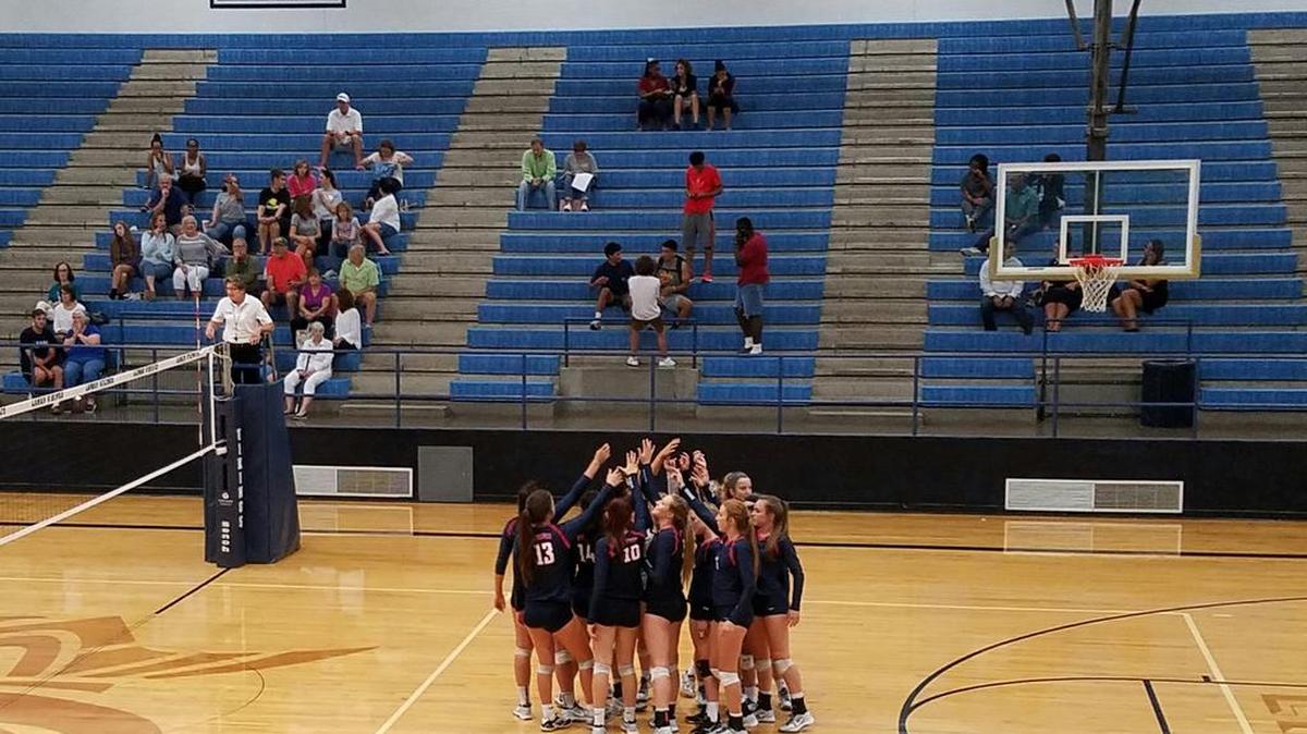 Justin Northwest celebrates on Tuesday after beating Arlington Lamar in four sets.