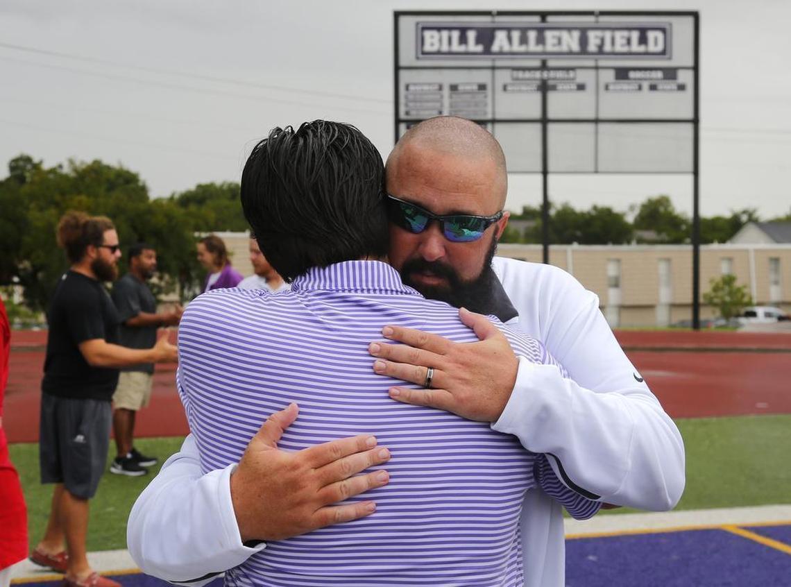 Paschal baseball coach Darrell Preston, right, is hugged by a friend after a vigil at Paschal High School for Drew Medford, who died in a one car accident Aug. 18, 2016. Medford was a graduate of Paschal High School graduate and an incoming freshman at TCU where he planned to play baseball.