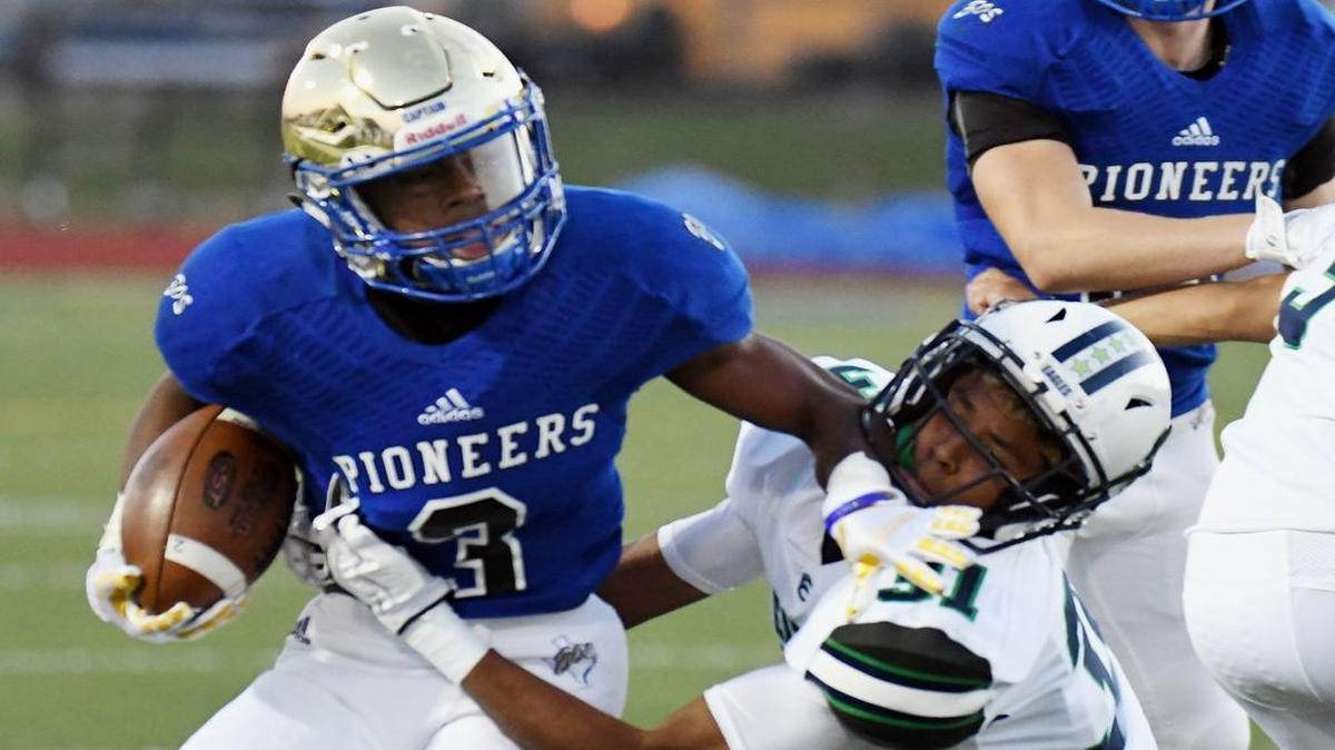 Boswell’s Breshun Berry, left, stiff-arms Eaton’s Brandon Johnson to the ground as he runs for a first down in the first quarter of Friday’s October 6, 2017 football game at Boswell Pioneer Stadium in Fort Worth, Texas.