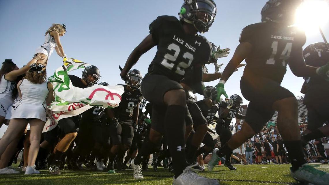 The Mansfield Lake Ridge Eagles take the field in a September game.