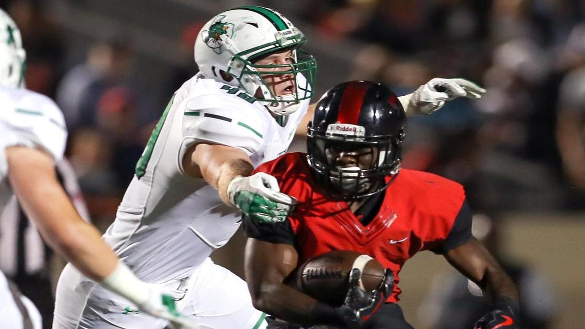 Trinity running back Courage Keihn (21) had a huge second half against Carroll.