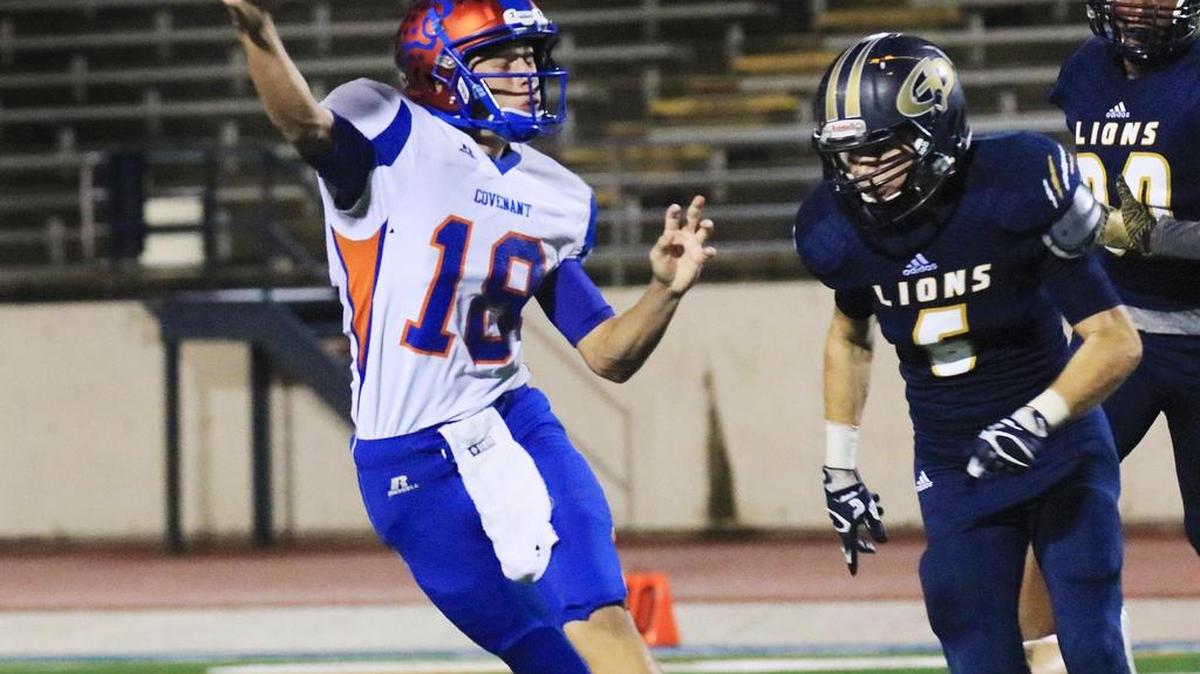 Joshua Smith (18) of Colleyville Covenant gets off a pass as he is pressured by Matthew Tucker of Grace Prep.