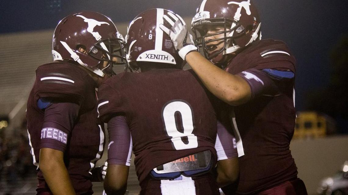 North Side players celebrates a touchdown against Diamond Hill-Jarvis at Farrington Field in Fort Worth, Texas, Sept. 22, 2017.