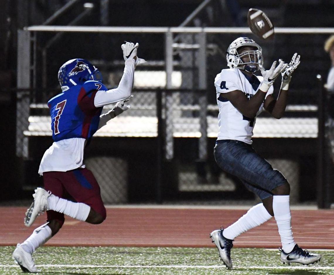 Richland receiver Rashee Rice (4) eyes a touchdown catch as Southwest’s Sammi Sanni closes in.