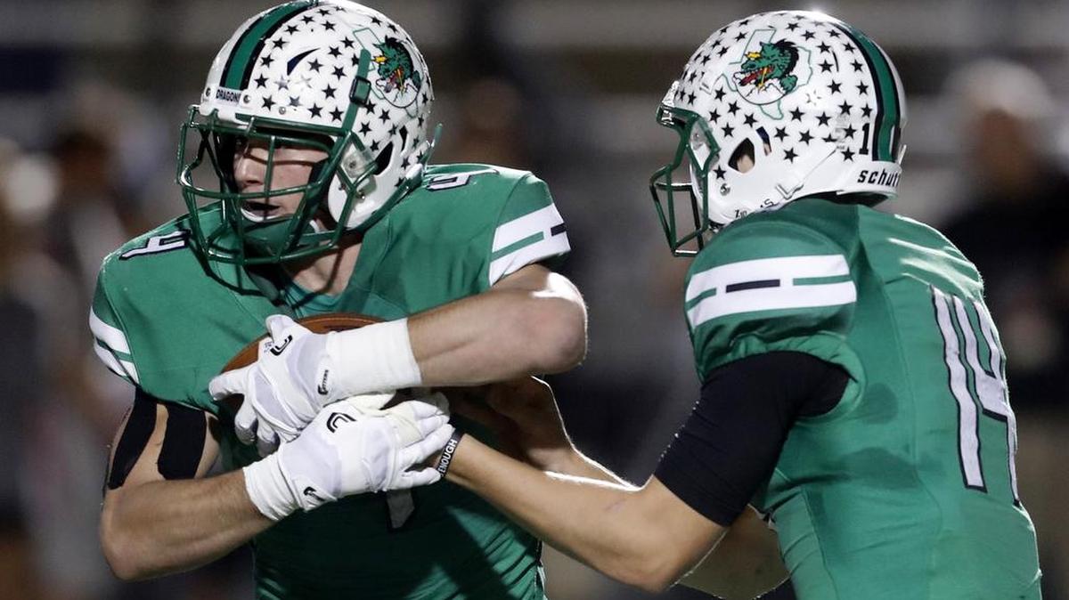 From Week 8 against Marcus, Carroll running back T.J. McDaniel takes the hand-off from Will Bowers as Marcus - Oct. 20, 2017.