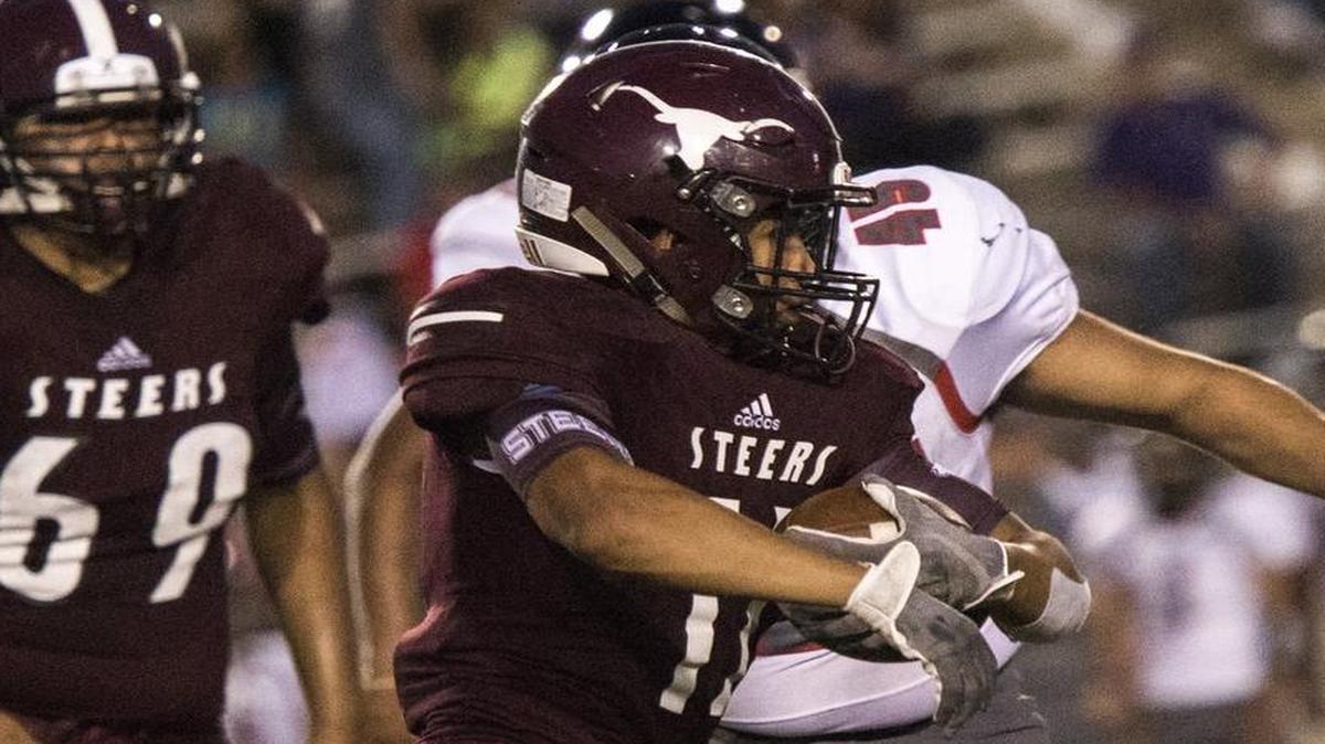 North Side running back Victor Narvaez (11) rushes during a high school football matchup between Diamond Hill-Jarvis and North Side on Sept. 22, 2017, at Farrington Field in Fort Worth, Texas.