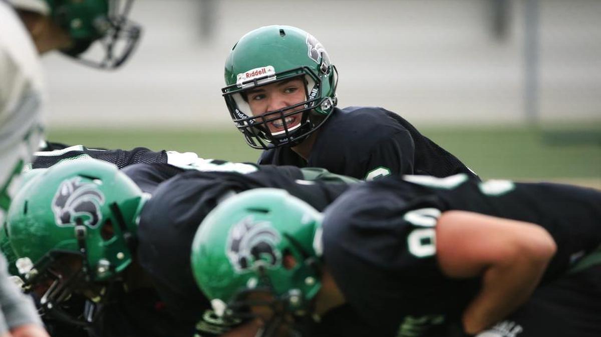 In a 2016 playoff practice, Kennedale quarterback Evan Jowers calls the snap count.