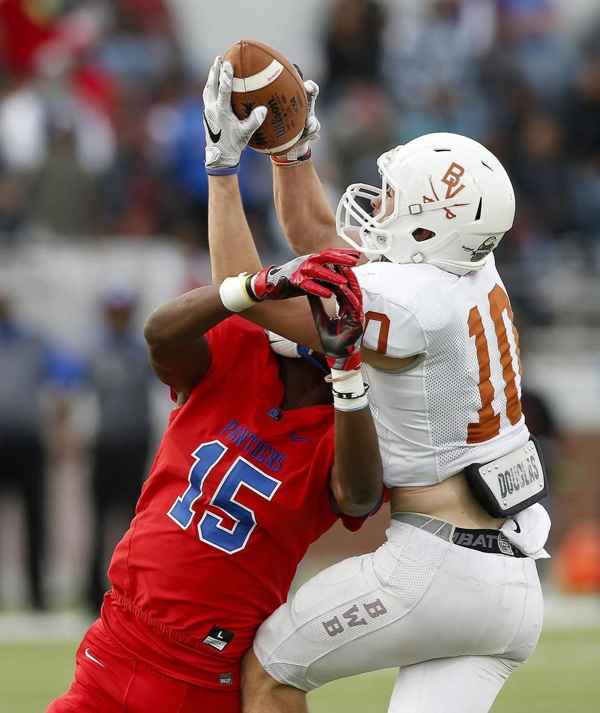Arlington Bowie defensive back Ty DeArman (10) intercepts a pass against Duncanville in the 2016 playoffs.