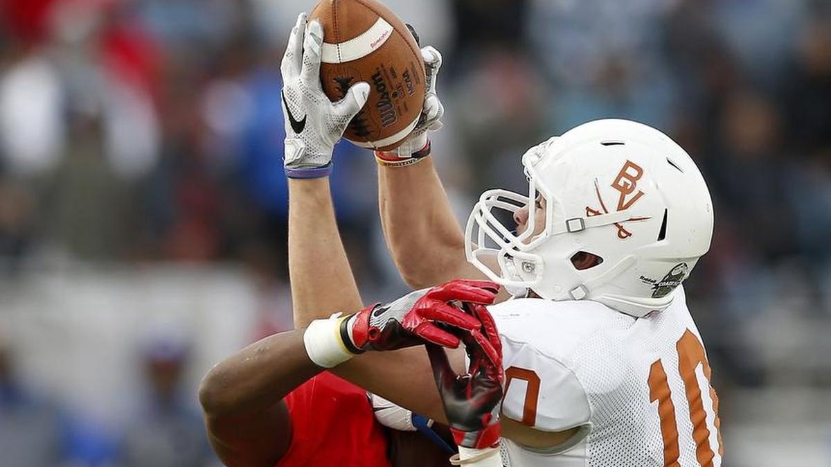 Arlington Bowie defensive back Ty DeArman (10) intercepts a pass against Duncanville in the 2016 playoffs.