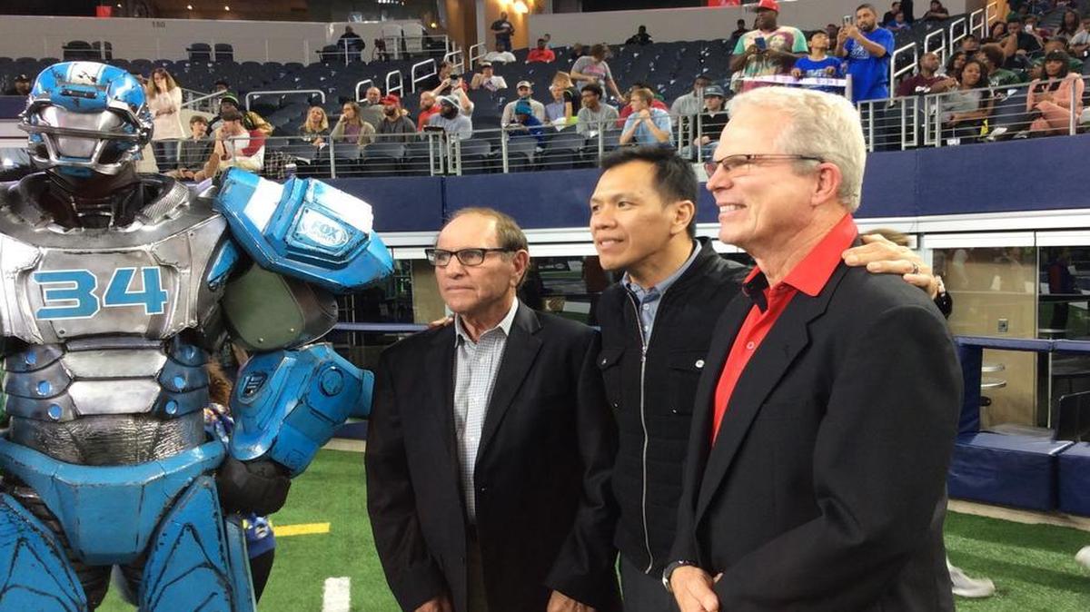 From left, FoxSports character Cletus, Eddy Peach, Dat Nguyen, and Steve Lineweaver at AT&T Stadium moments before the DeSoto-Cibolo Steele kickoff