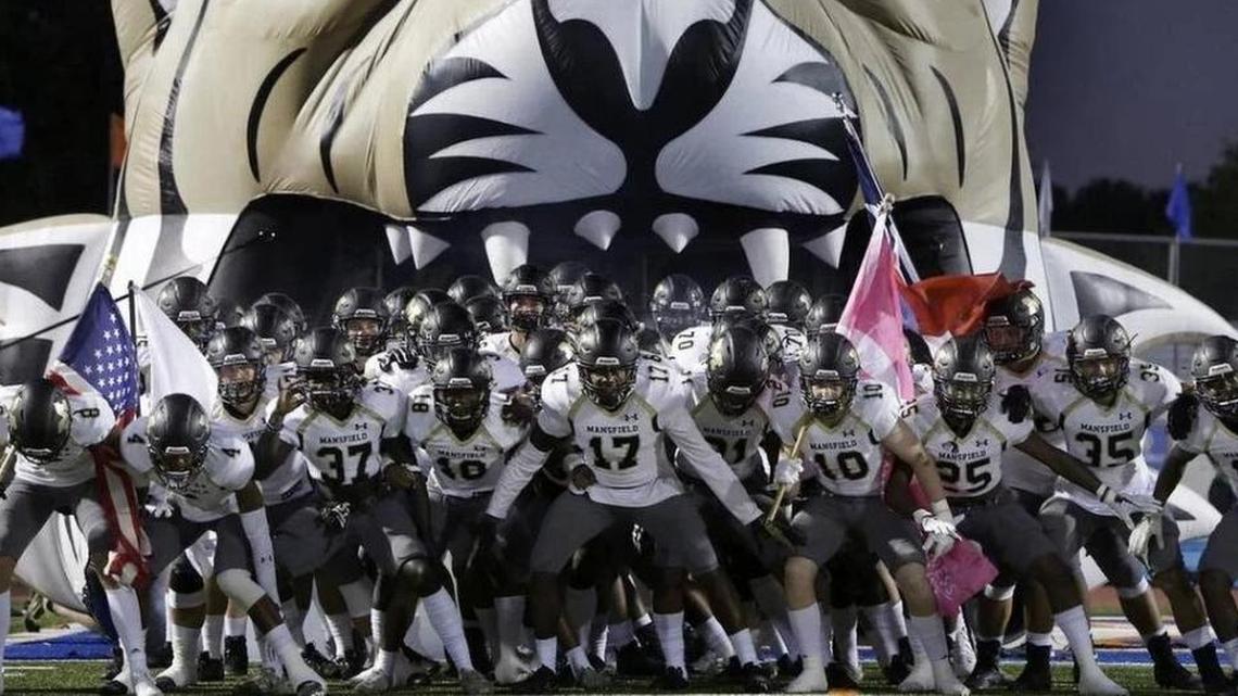 Mansfield Tigers take the field.