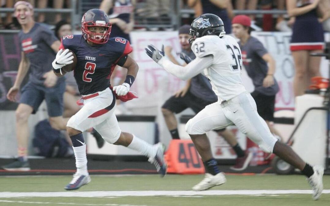 Northwest’s Syrus Moore (2) outruns Byron Nelson's Jaylen Perry for a long gain as Byron Nelson played Northwest in a high school football game on Sept. 09, 2016.