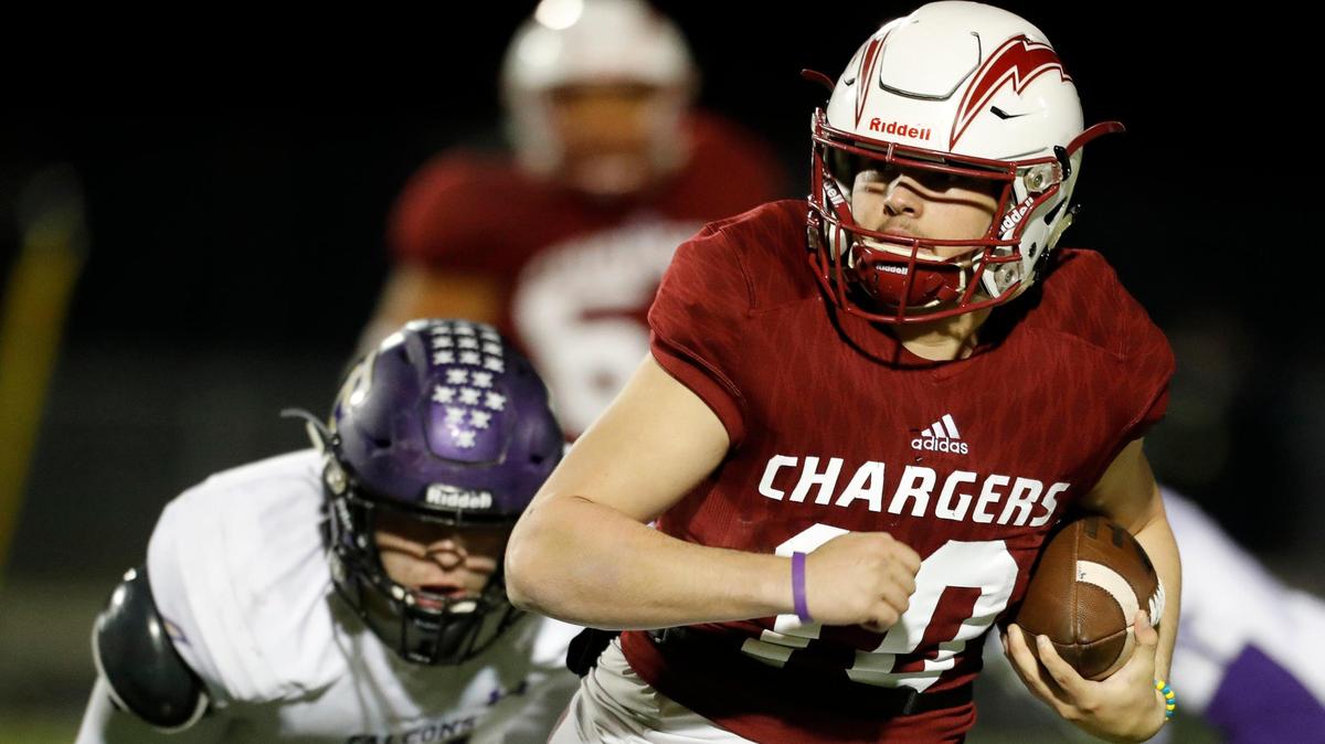 Keller Central quarterback Gavyn White (10) gets out of the backfield on a keeper during the second half of a high school football game at Keller ISD Stadium in Keller, Texas, Thursday, Oct. 31, 2019. Keller Central defeated Timber Creek 21-0. (Special to the Star-Telegram Bob Booth)