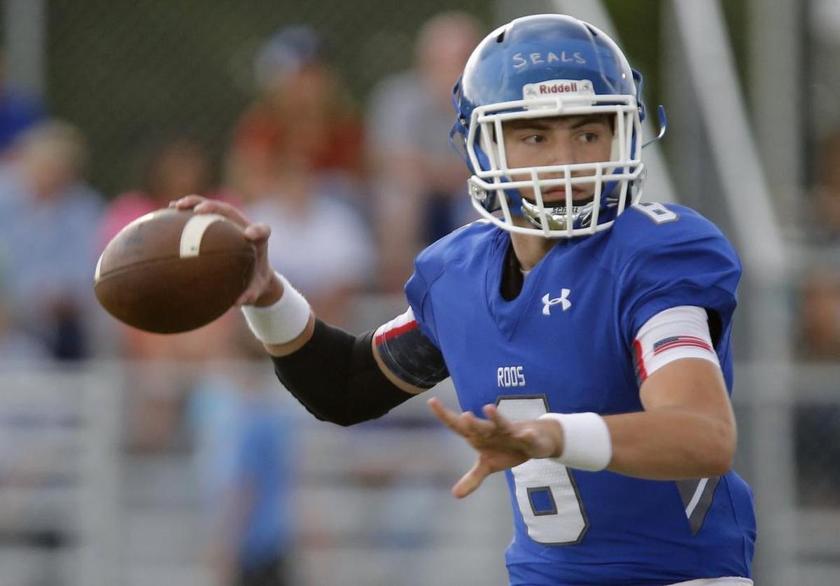 Quarterback Ken Seals passes during Weatherford’s spring football game on May 22, 2017.