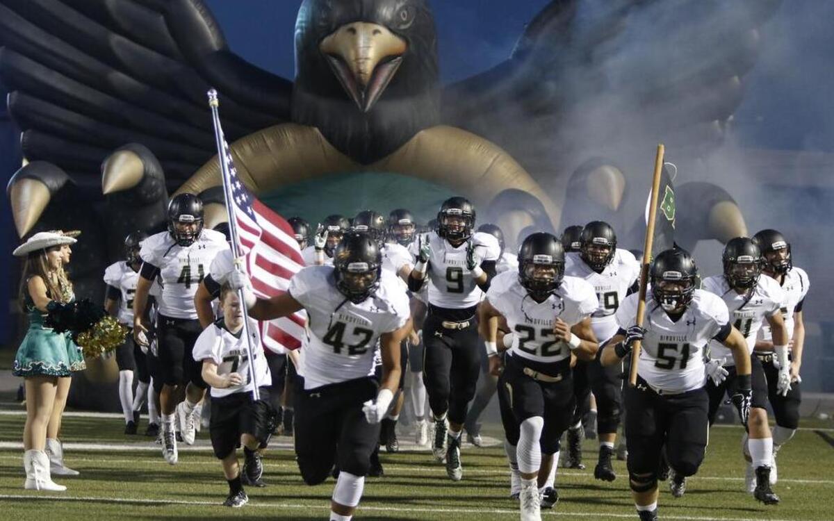 The Birdville Hawks enter the field as they play Richland at Birdville FAAC in North Richland Hills, Sept. 30, 2016.
