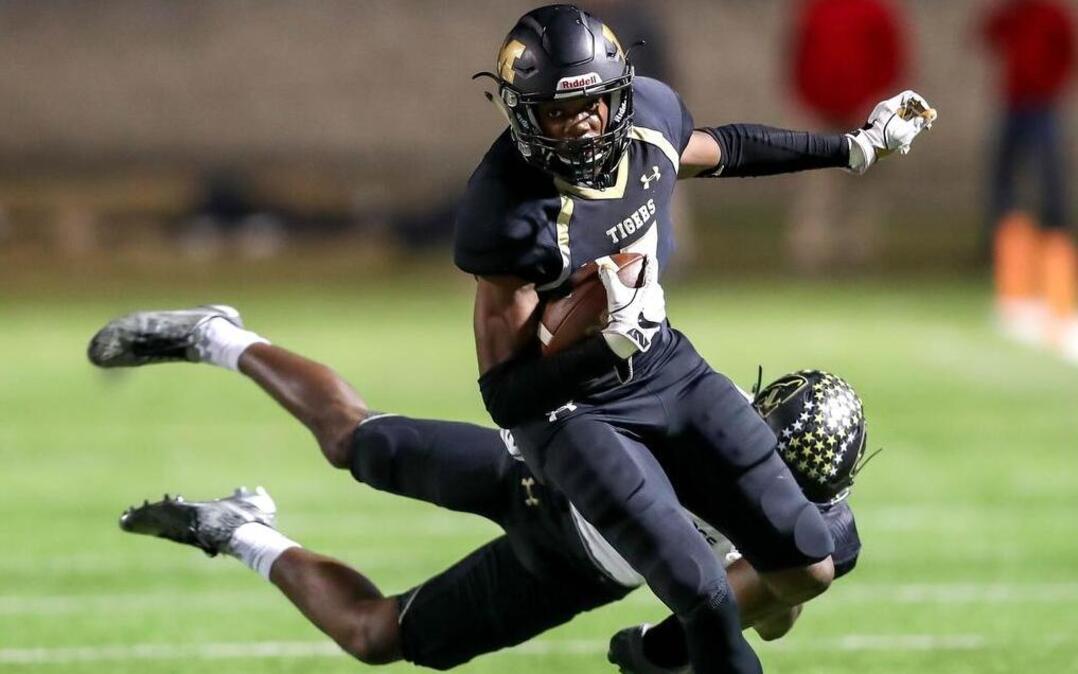 Mansfield WR Saiid Adebo finds running room against Keller Fossil Ridge in the 6A division II Bi-district football playoffs at Newsom Stadium in Mansfield.