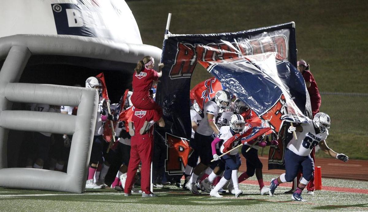 The Richland Rebels take the field for the first half of a high school football game against the Grapevine Mustangs at Mustang-Panther Stadium in Grapevine, Texas on Friday, Oct. 20, 2017.