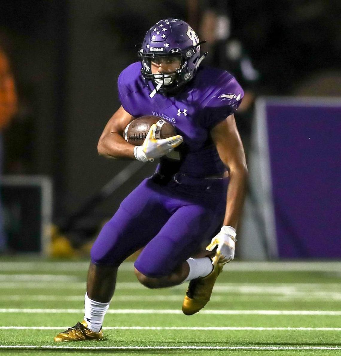 Keller Creek Timber running back Blake Irving looks for running room against Keller Fossil Ridge.