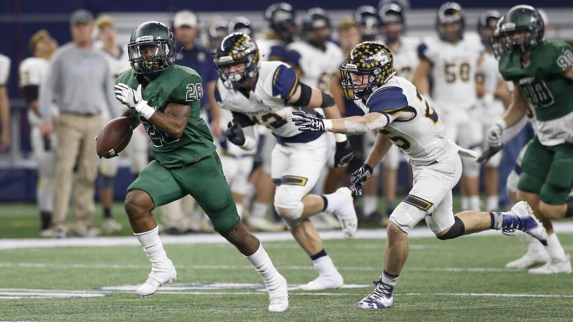 Kennedale running back D.J. Kirven (28) breaks a long run for one of his five rushing touchdowns in Friday’s Class 4A playoff semifinal win over Stephenville.