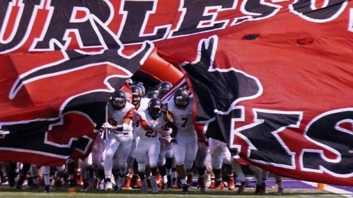 A Burleson High football player remained hospitalized Saturday night with a serious head injury, about 24 hours after falling out of the back of a motionless pickup in what Elks coach Gary McElroy called a freak accident.
