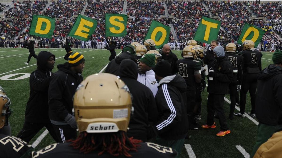 The DeSoto Eagles celebrate after scoring a touchdown against the Allen Eagles in football playoff game.