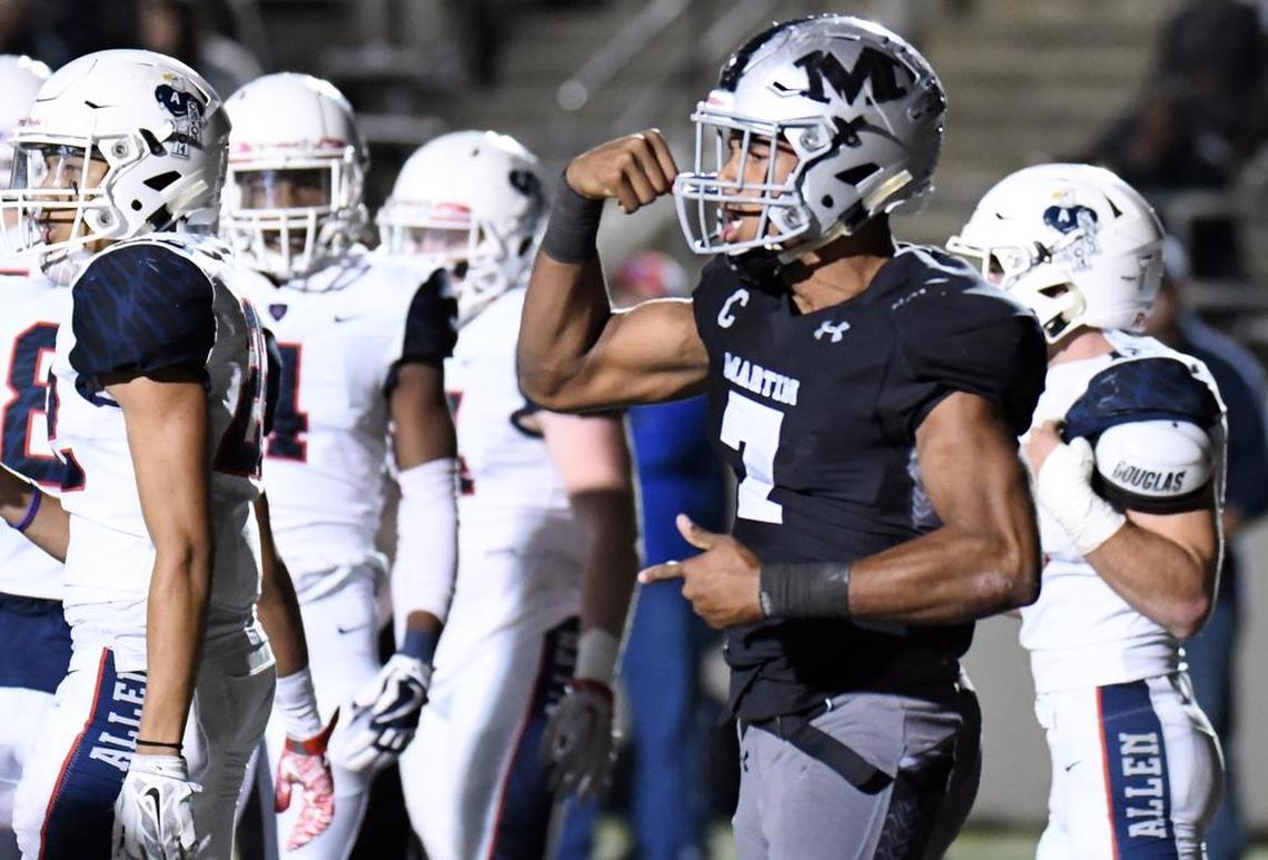 Arlington Martin's Brayden Willis (7) celebrates a touchdown against Allen, Dec. 1, 2017.