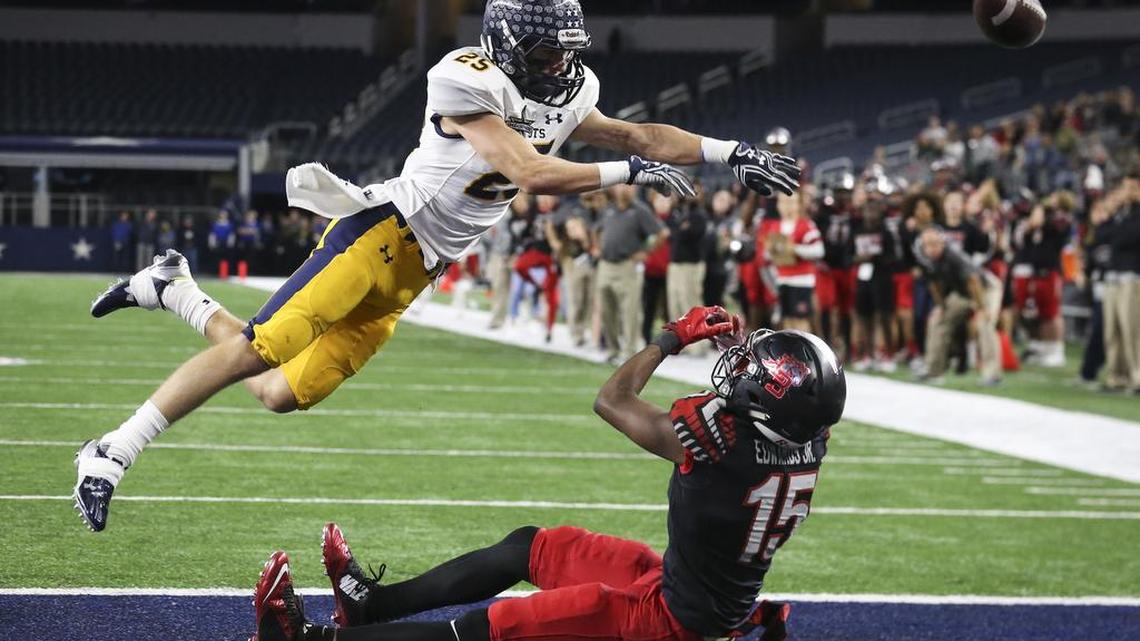 Highland Park defender George Stewart breaks up a fourth-and-goal pass into the end zone intended for Mansfield Legacy’s Troy Edwards Jr.