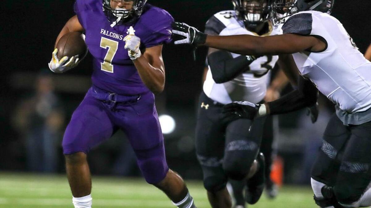 Keller Timber Creek running back Blake Irving (7) goes around the corner for a 56 yard touchdown run against Keller Fossil Ridge, during the first half Friday night, September 29, 2017 played at Keller ISD AC.