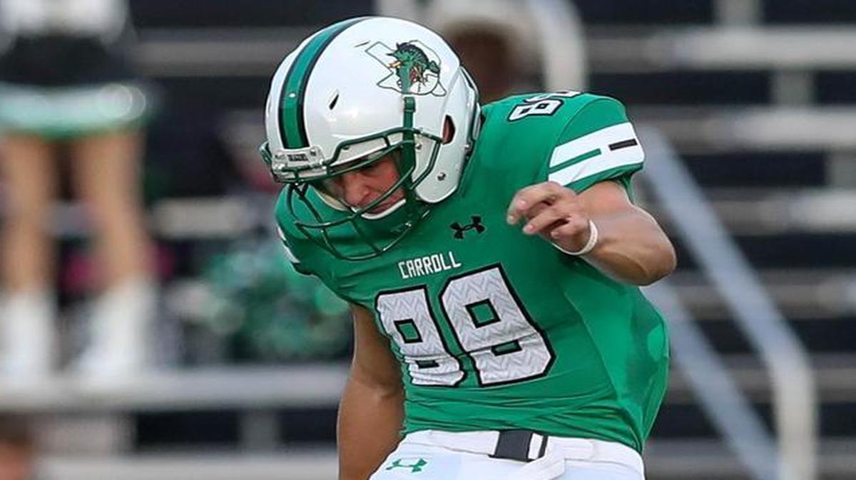 Southlake Carroll kicker Kole Ramage kicks the ball to Tulsa Union on Friday night. Ramage kicked a 55-yard field goal during the game.