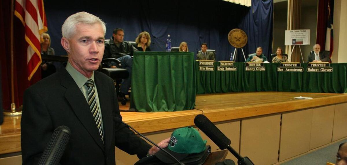 New head football coach Hal Wasson is introduced at a Carroll ISD school board meeting in 2007.