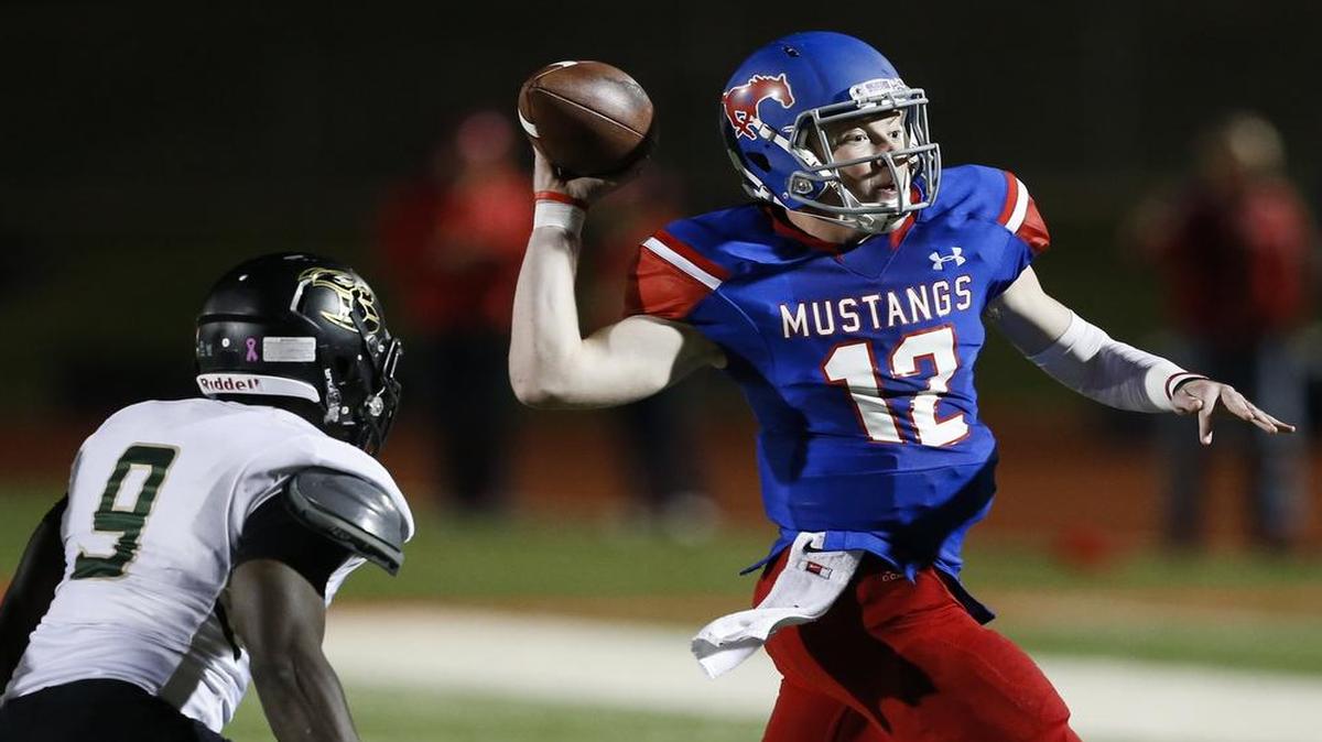 Grapevine junior quarterback Alan Bowman, right, passed for 2,711 yards and 27 touchdowns last season.