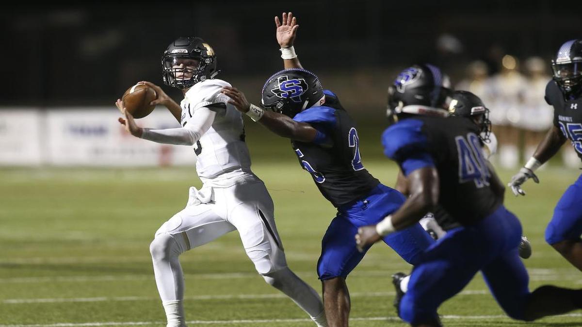 Mansfield Tigers quarterback Shawn Hartsfield (15) is well ahead of his 2016 stats at this point of the season.