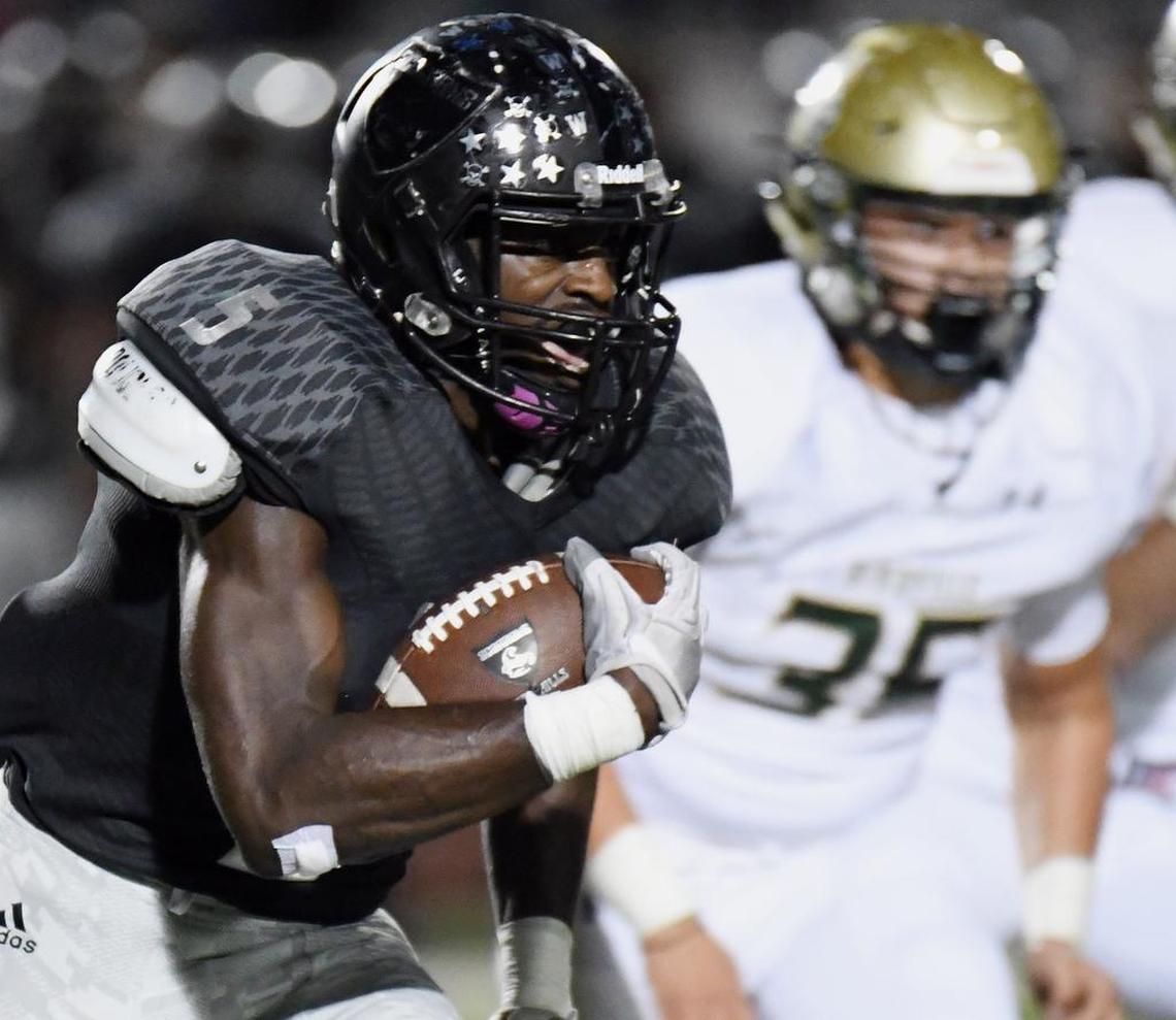 South Hills athlete Anthony Watkins (5) is pursued by Birdville’s Nick Martinez in a playoff game, Nov. 17, 2017.
