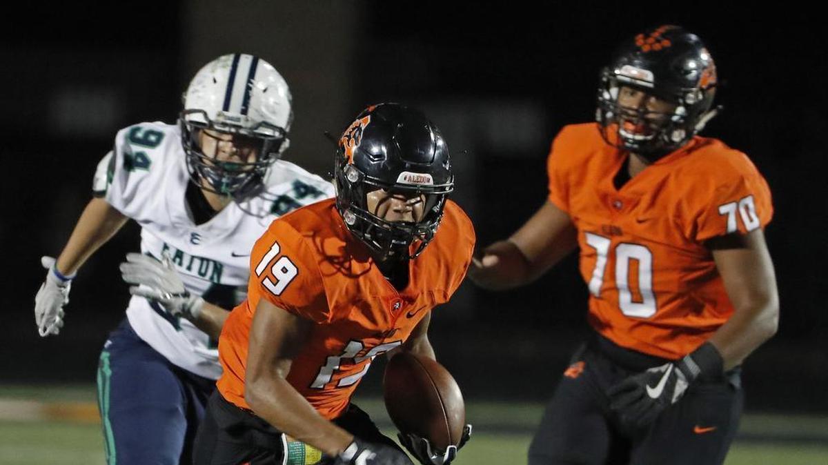 Aledo running back Tre Owens (19) breaks away for yards against Eaton.