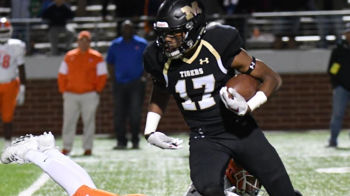 Mansfield’s Cam’ron Jones (17) evades a San Angelo Central defender on a kick return during a 2017 second-round playoff game.