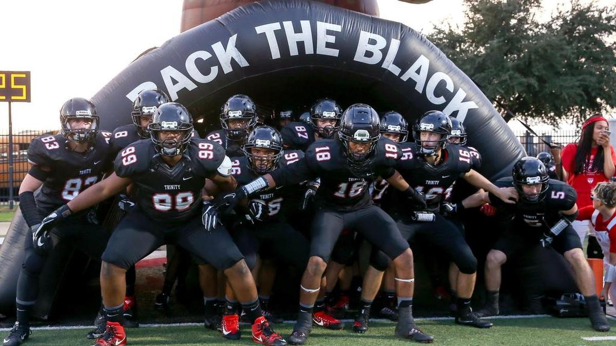 The Trinity Trojans get ready to face the Colleyville Heritage Panthers September. 15, 2017 at Pennington Field in Bedford.
