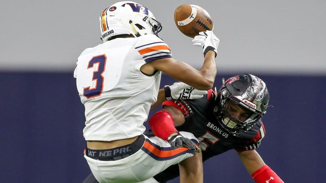Mansfield Legacy defensive back Jalen Catalon (5) separates Friso Wakeland’s Tre Adams from the ball during a playoff game at The Ford Center at the Star in Frisco, Nov. 25, 2016. Catalon on Thursday was selected defensive player of the year on the Texas Sports Writers Association Class 5A All-State football team.
