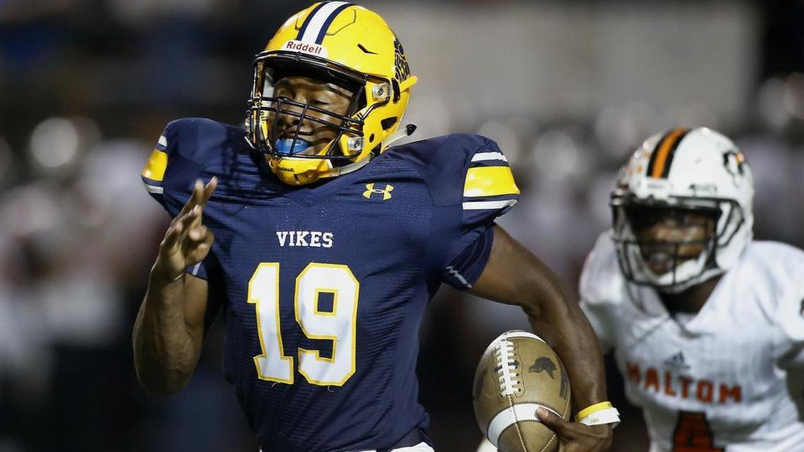 Arlington Lamar Vikings wide receiver Trevon West (19) breaks free for a touchdown reception past Haltom Buffalos safety Keyon Shannon (4) in the first half of a high school playoff football game at the Gopher-Warrior Bowl in Grand Prairie, Texas on Thursday Nov. 16, 2017.