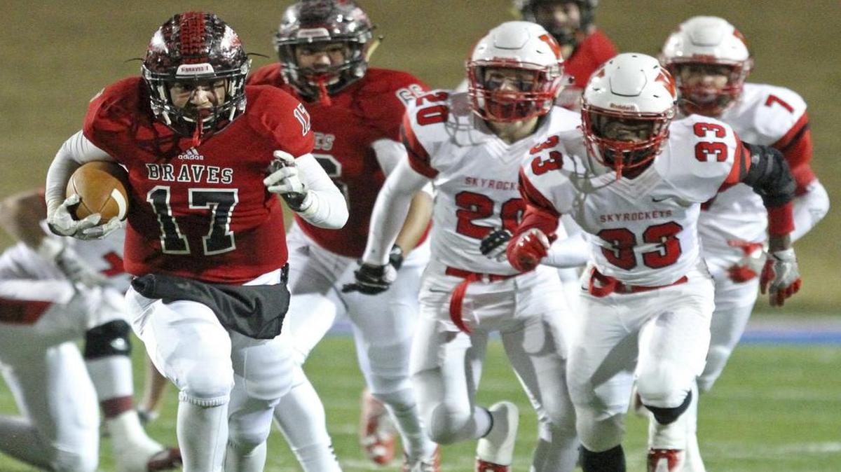 Iraan quarterback Daryel Lozoya (17), here rushing for a 68-yard-touchdown in a playoff game against Wellington on Dec. 9, 2016, made the All-state second team.
