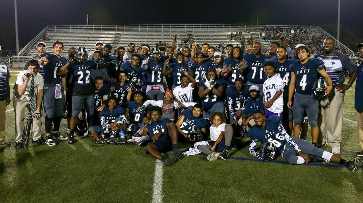 The YMLA Wildcats beat the North Side Steers, 38-14 to clinch a playoff spot.