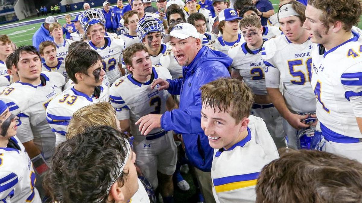 Brock head coach Chad Worrell addresses his team after beating Kemp, 49-21, Thursday at AT&T Stadium.