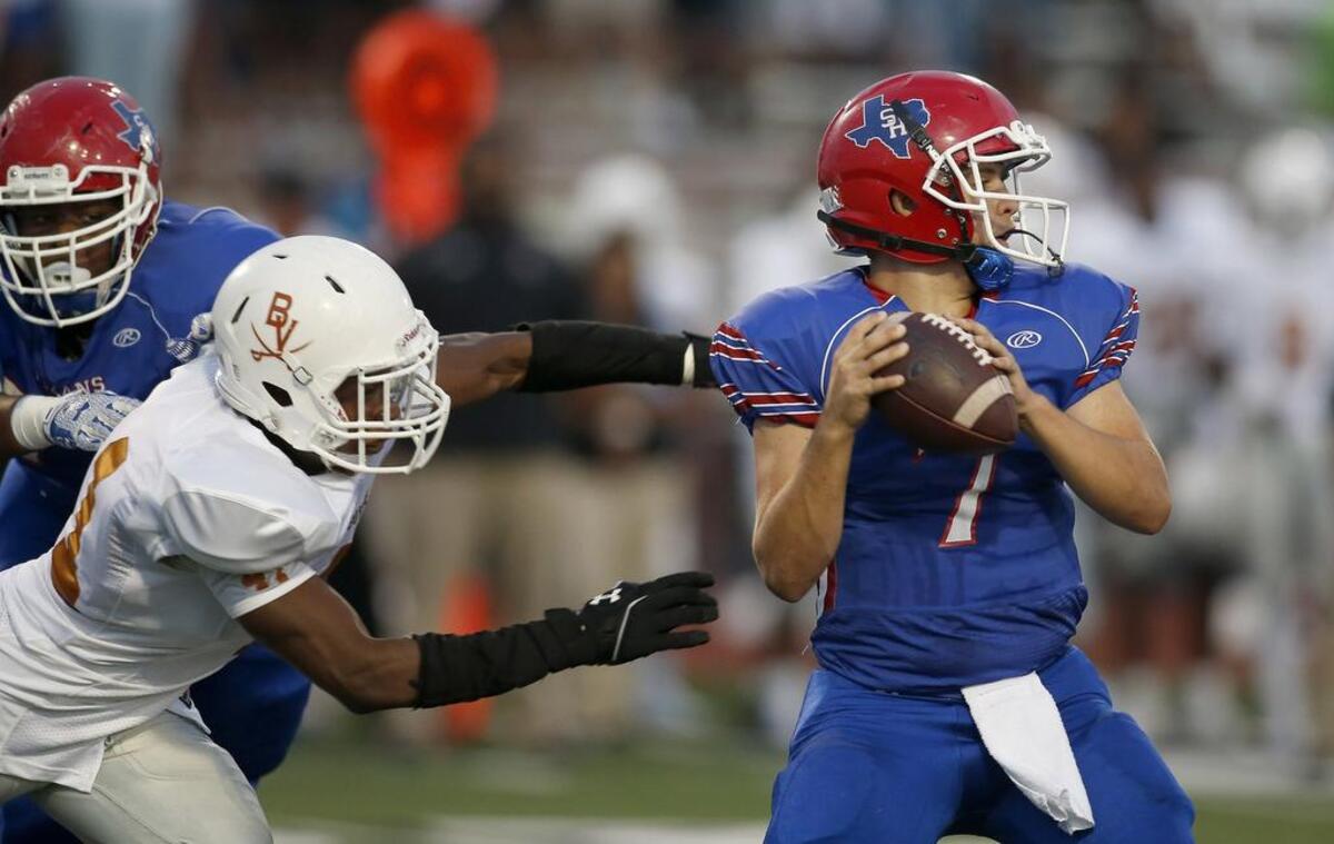Arlington Sam Houston quarterback Jacob Dollar, right, started all 10 games for the Texans in 2015. He returns to pilot an offense that will look for balance after the graduation of workhorse tailback Peytton Pickett.